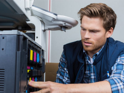 Man Servicing Photocopier | Greenan